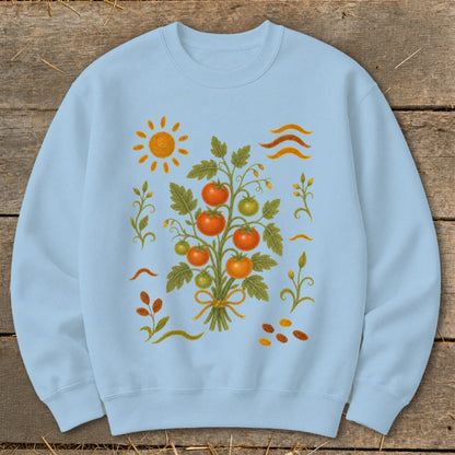 Light blue sweatshirt with a tomato plant graphic, sun, and wavy lines.