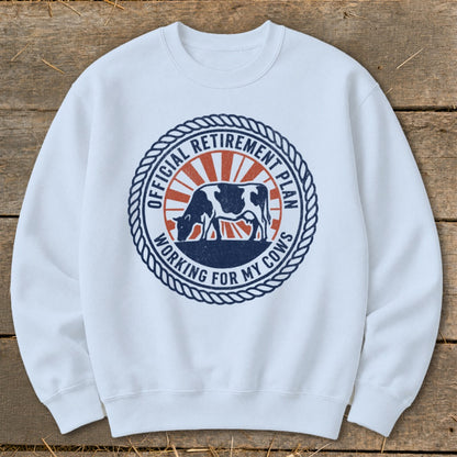 White sweatshirt with "Official Retirement Plan Working for My Cows" text and a cow graphic.