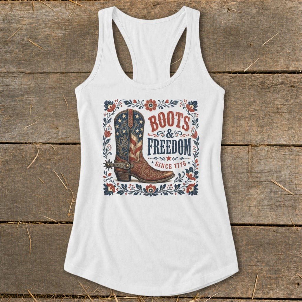 White tank top with Boots & Freedom since 1776 graphic featuring a cowboy boot.