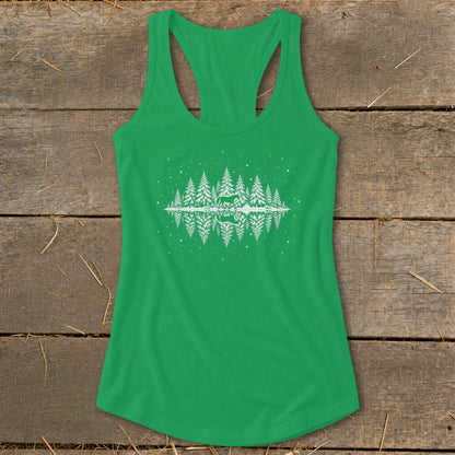 Green tank top with white graphic of trees, deer, and stars reflected in water.