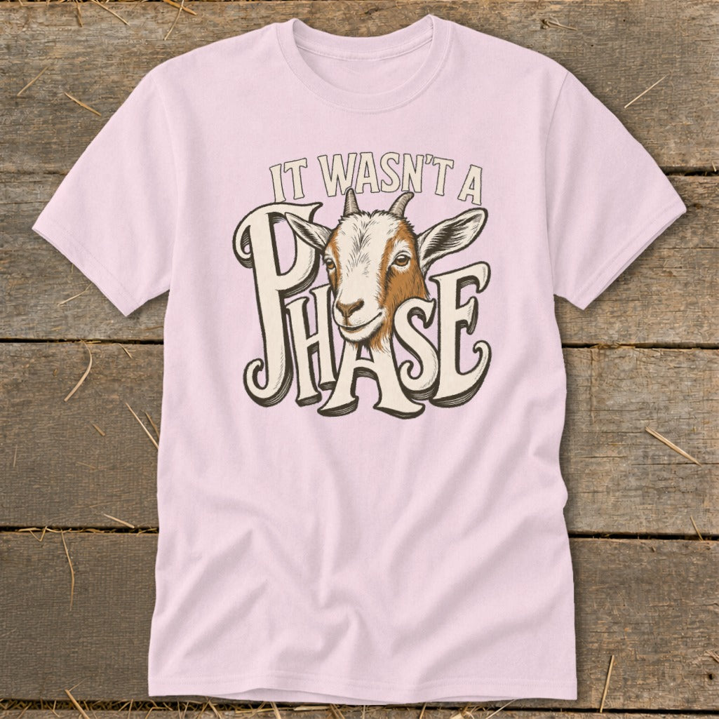 Pink t-shirt with goat head and text "IT WASN'T A PHASE".