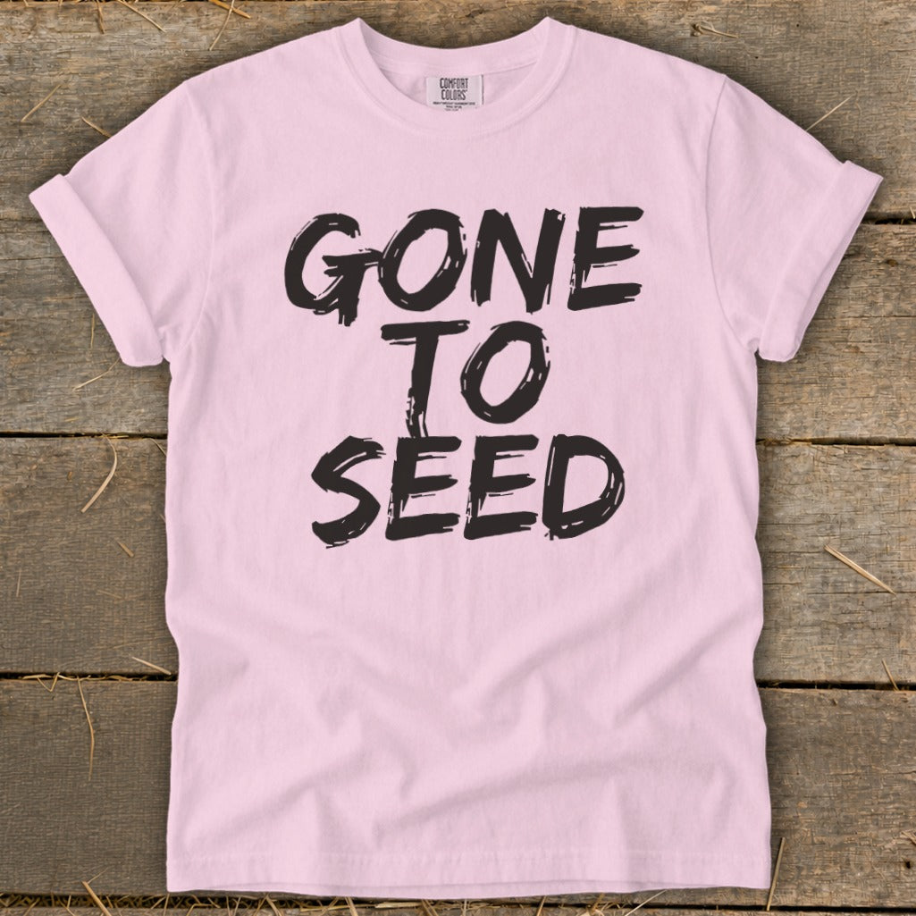 Pink t-shirt with "GONE TO SEED" in distressed black lettering.
