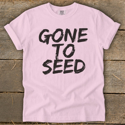 Pink t-shirt with "GONE TO SEED" in distressed black lettering.
