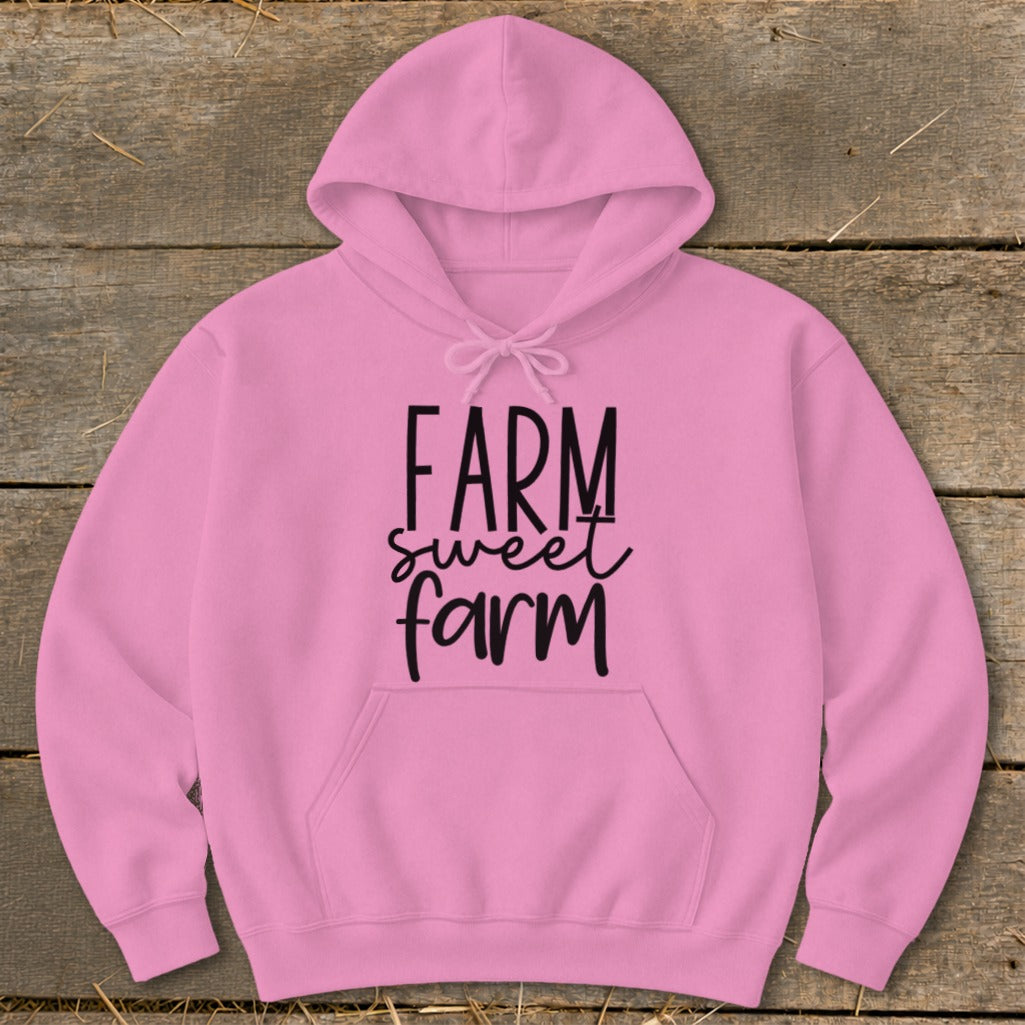 Pink hooded sweatshirt with "Farm sweet farm" text on chest.