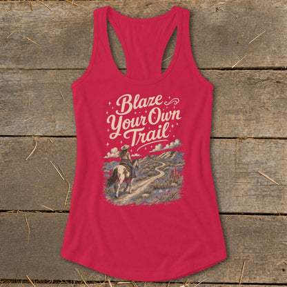 Pink tank top with "Blaze Your Own Trail" text and desert landscape graphic.