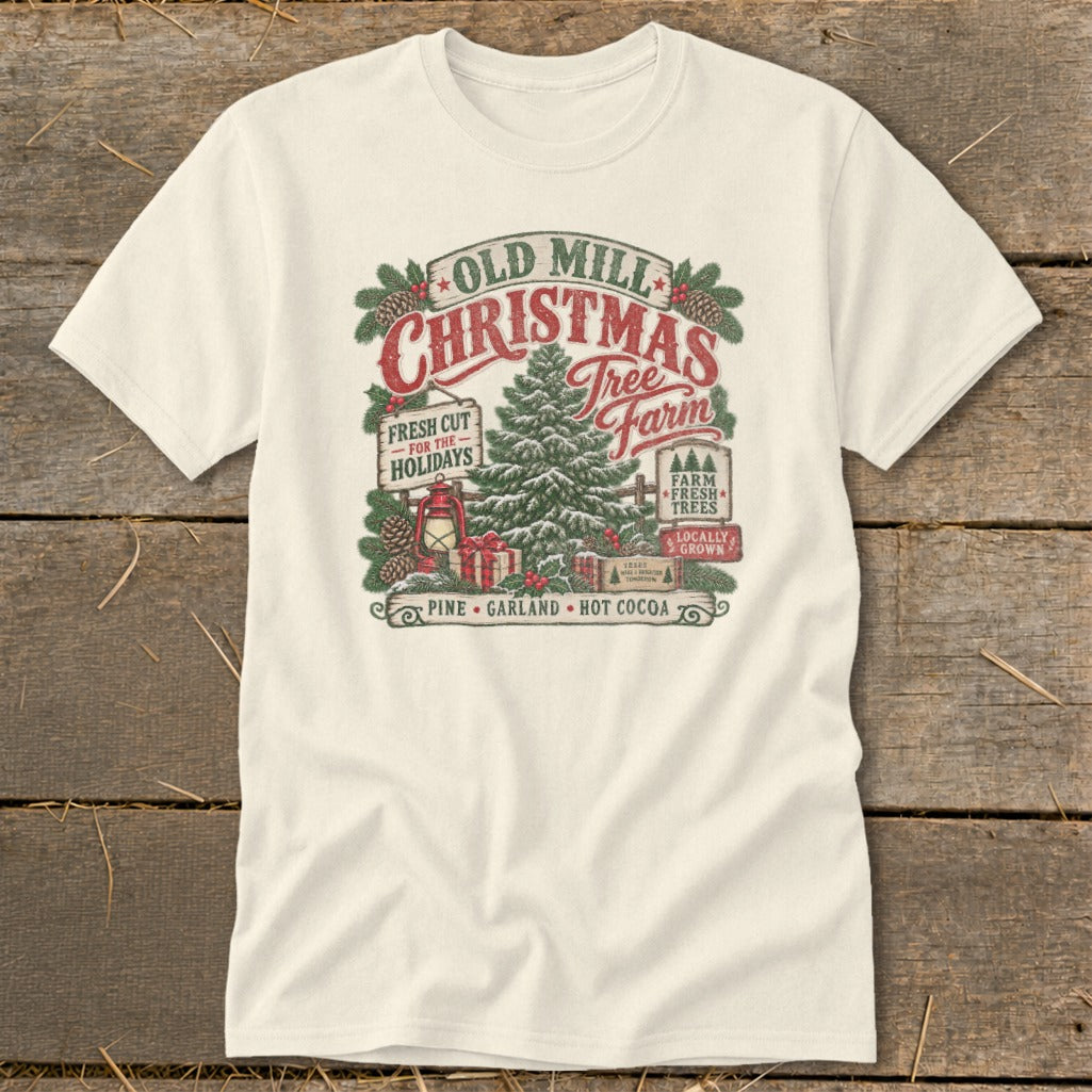Cream t-shirt with "Old Mill Christmas Tree Farm" graphic, featuring a tree, presents, and text.