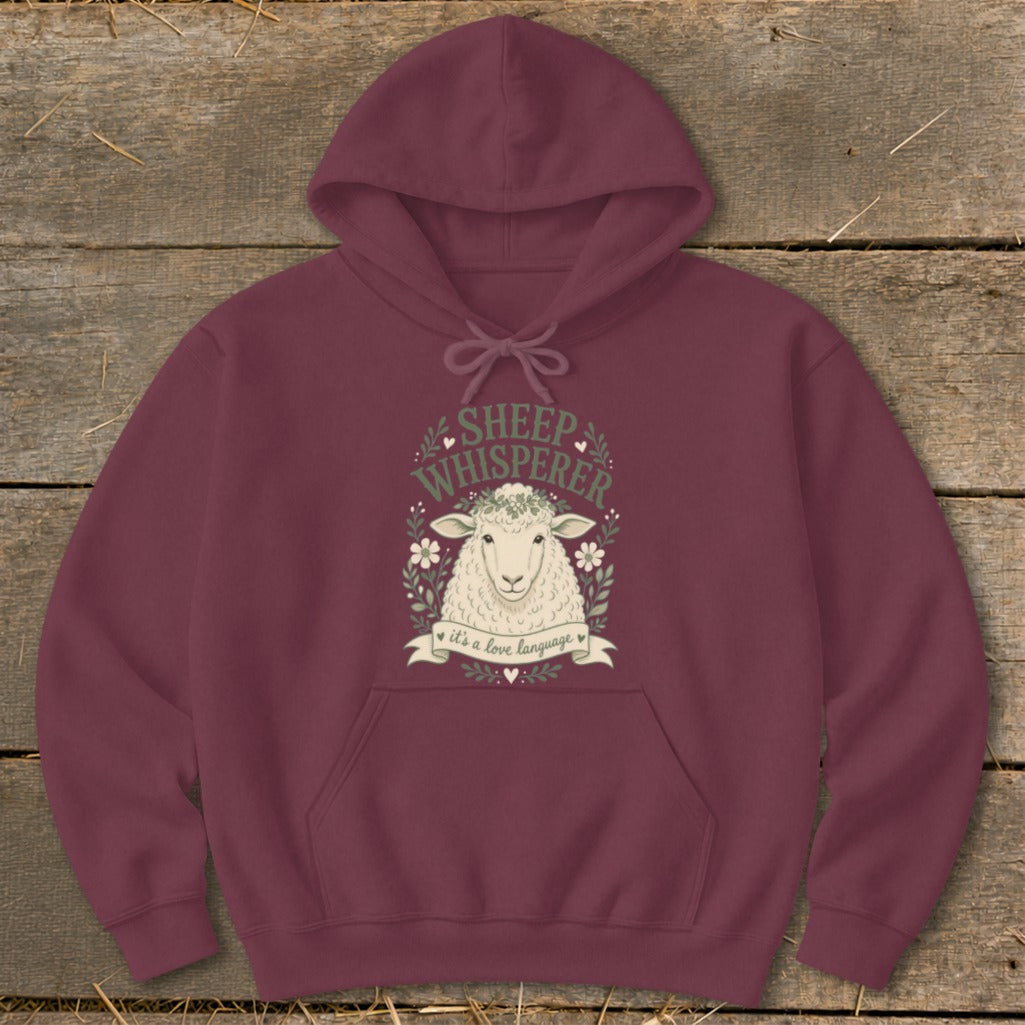 Maroon hoodie with sheep graphic and text "Sheep Whisperer it's a love language."