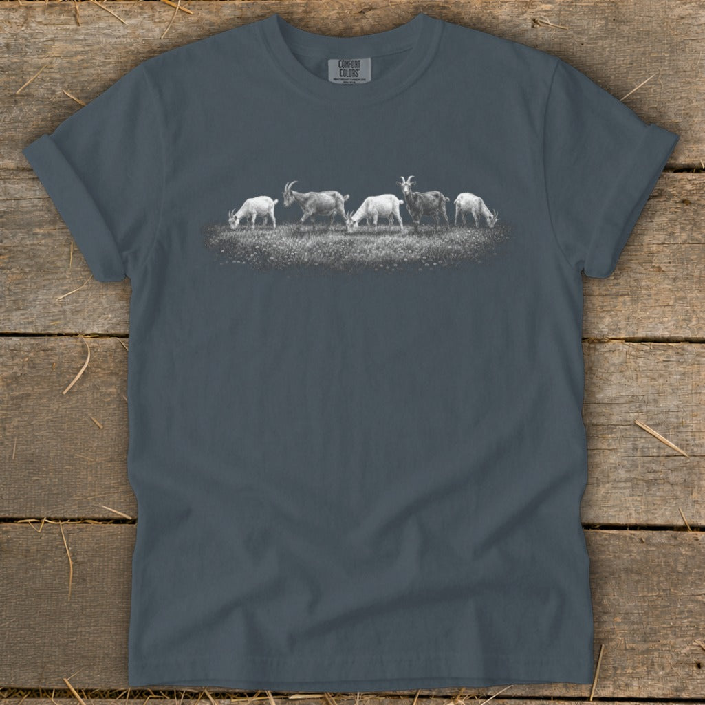 T-shirt with charcoal gray color featuring a herd of goats grazing in a field.