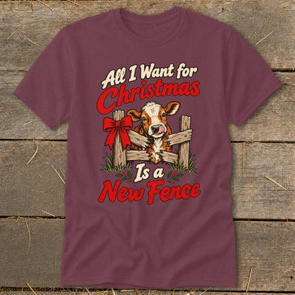 Burgundy t-shirt with a calf behind a wooden fence with a bow and text "All I Want for Christmas Is a New Fence."