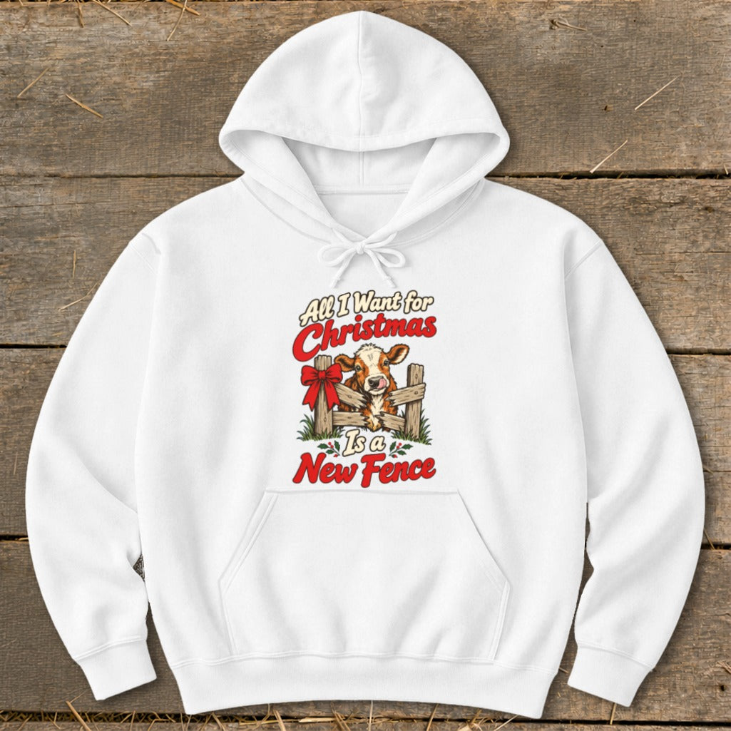 White hoodie with a graphic of a cow behind a fence, "All I Want for Christmas Is a New Fence."