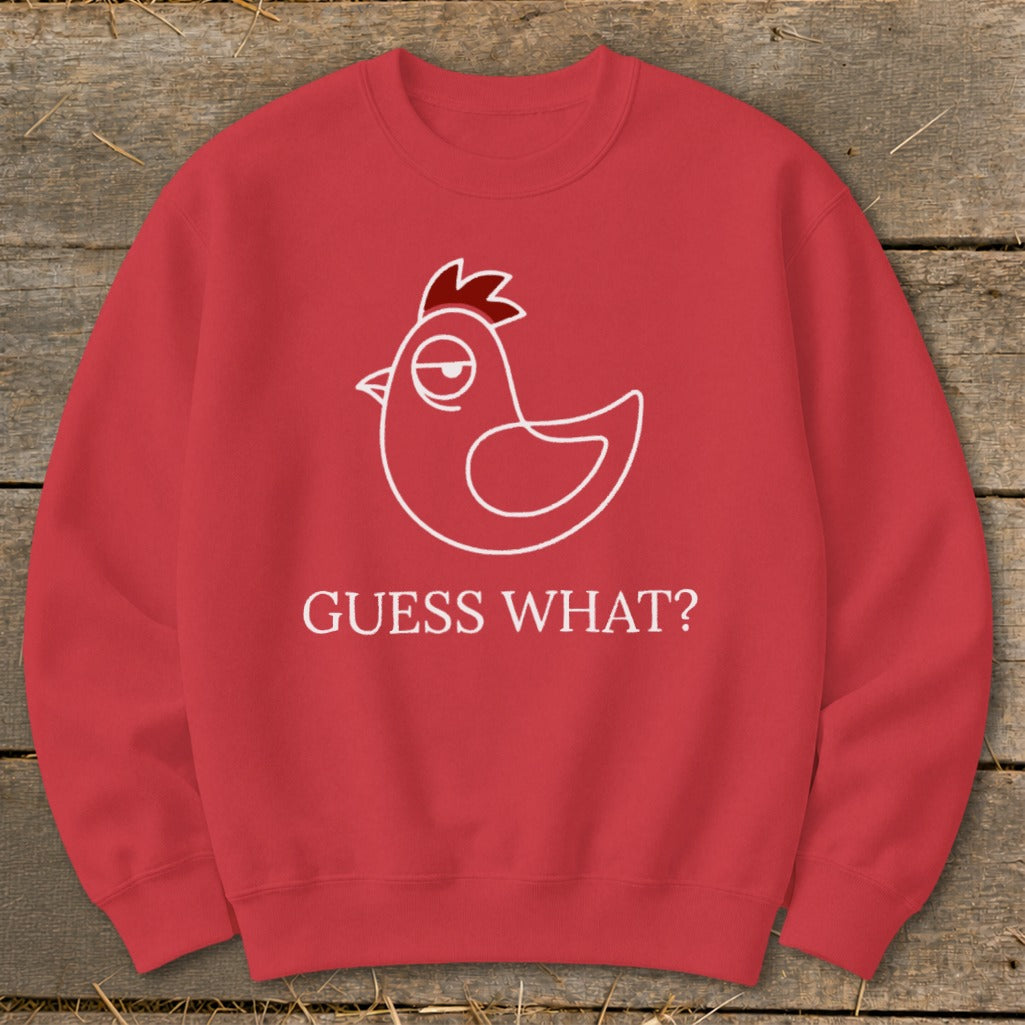 Red sweatshirt with white line drawing of a chicken and text "GUESS WHAT?".