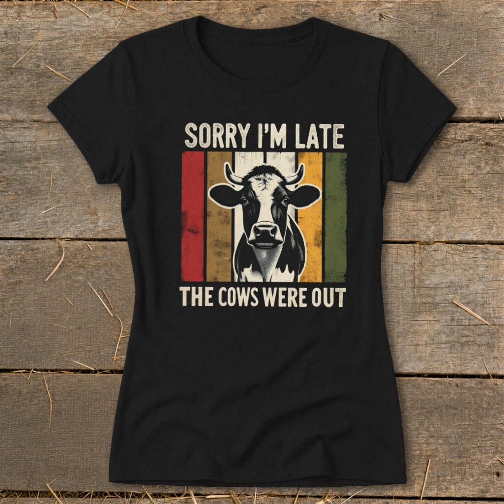 Black t-shirt with distressed graphic of a cow and text: Sorry I'm Late The Cows Were Out.
