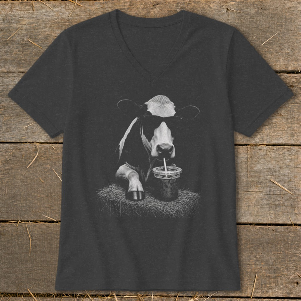Black and white graphic of a cow wearing sunglasses and drinking from a straw.
