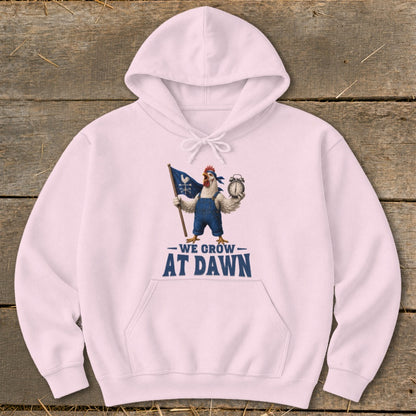 Pink hoodie with cartoon chicken holding flag and alarm clock, text "WE GROW AT DAWN".
