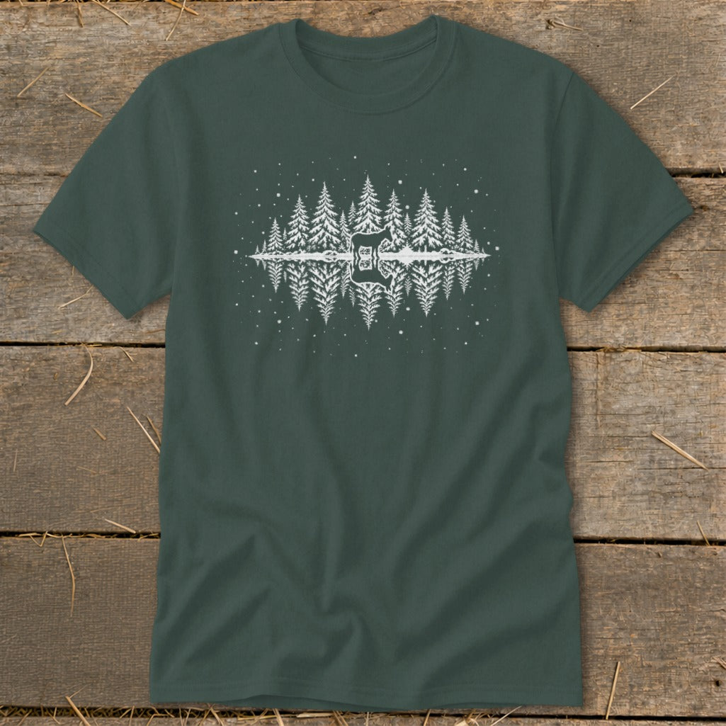 Dark green t-shirt with a white forest and guitar graphic and reflection.