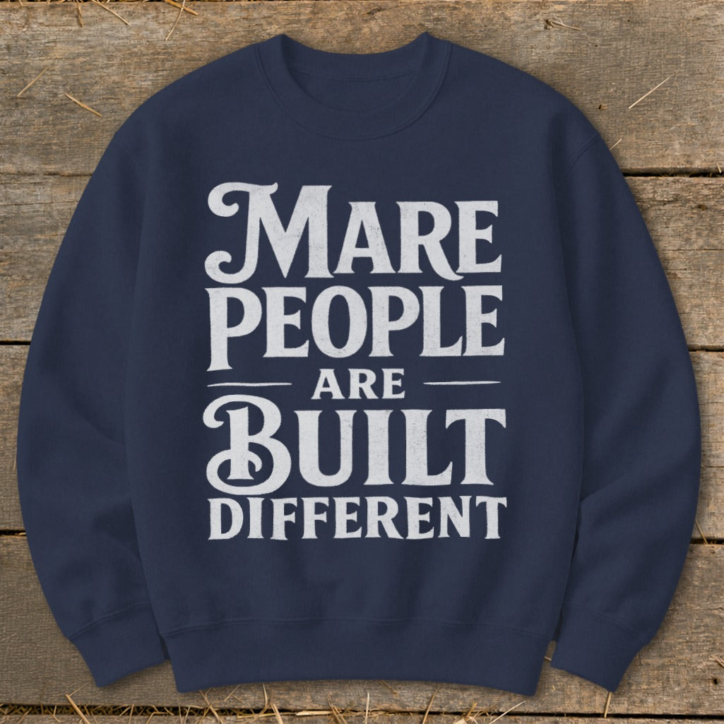 Navy sweatshirt with white text reading "Mare people are built different."