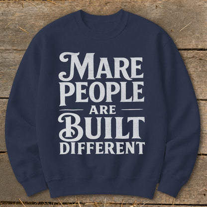 Navy sweatshirt with white text reading "Mare people are built different."