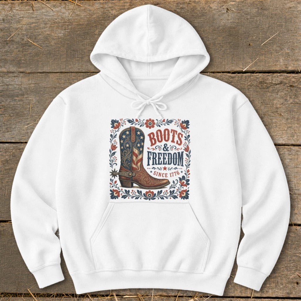 White hoodie with "Boots & Freedom Since 1776" graphic and patriotic cowboy boot.