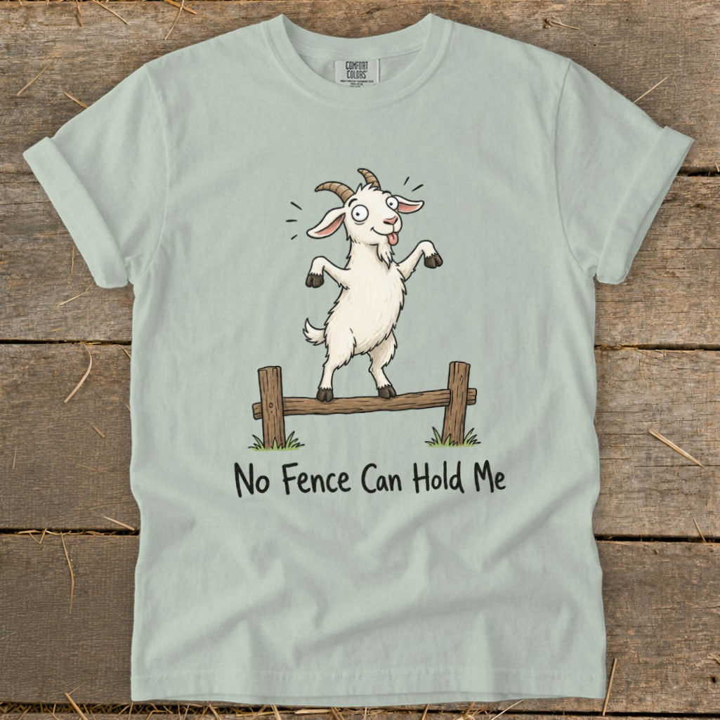 Light blue t-shirt with cartoon goat on fence saying "No Fence Can Hold Me".