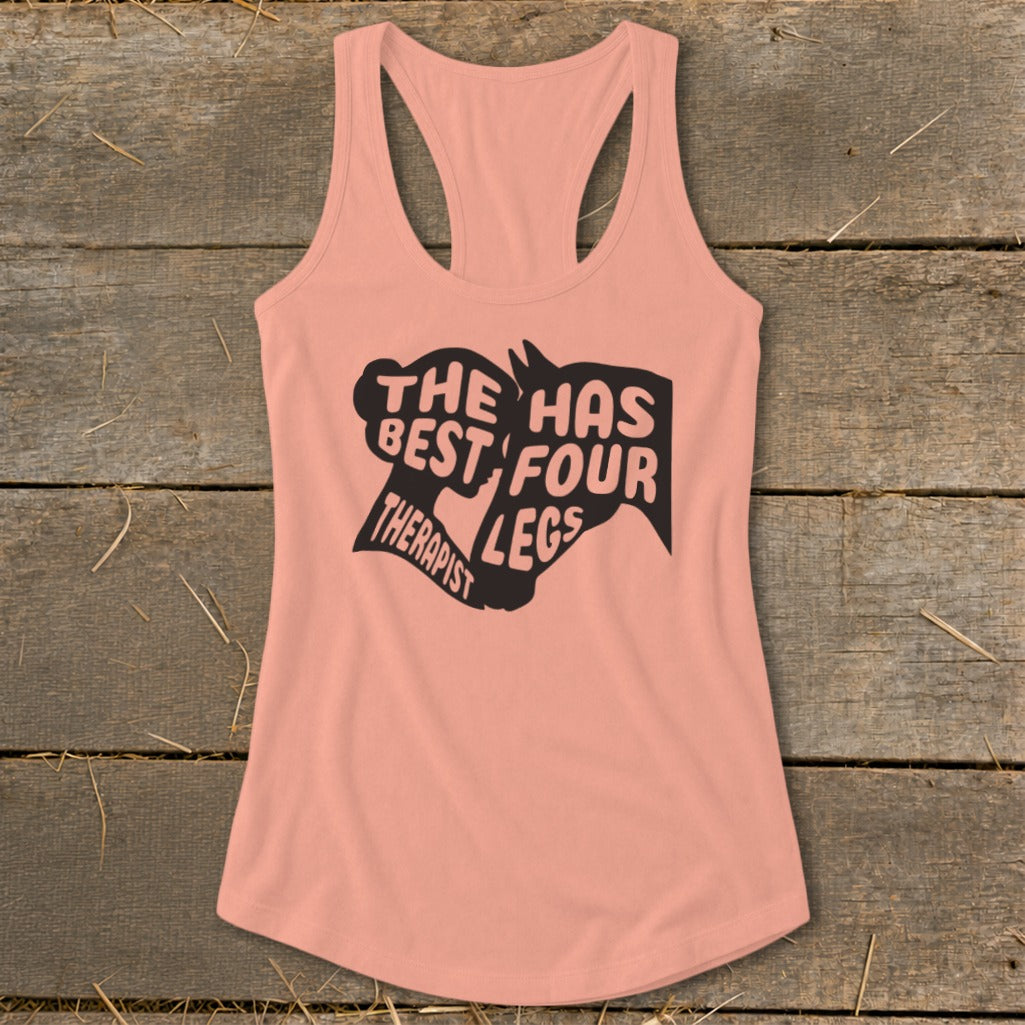 Peach tank top with black graphic text: "The best therapist has four legs."
