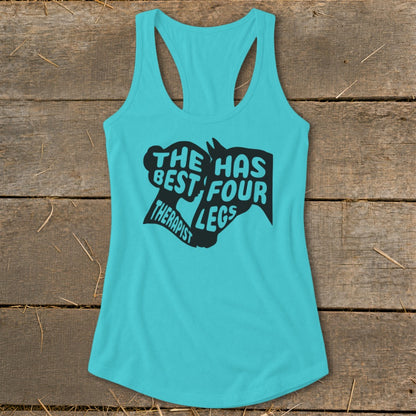 Turquoise tank top with black text and horse head graphics reading "The best therapist has four legs".