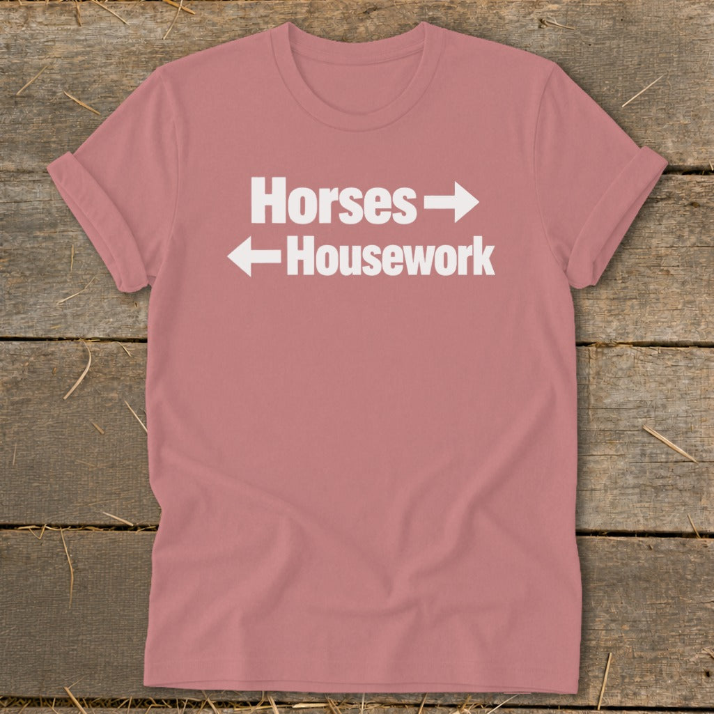 Mauve short-sleeve t-shirt with white text reading Horses with a right arrow and Housework with a left arrow.