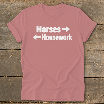 Mauve short-sleeve t-shirt with white text reading Horses with a right arrow and Housework with a left arrow.