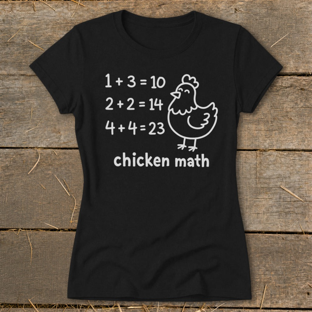 Black t-shirt with white text and a cartoon chicken. Reads "Chicken Math".