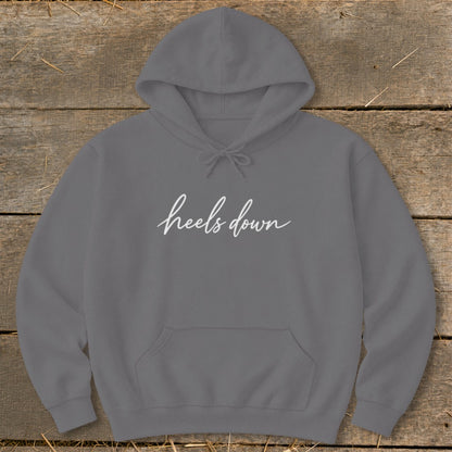 Grey hooded sweatshirt with white "heels down" text across the chest.