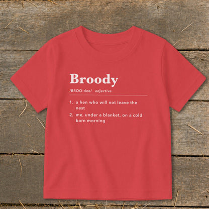 Red t-shirt with "Broody" definition: "a hen who will not leave the nest" and "me, under a blanket, on a cold barn morning".
