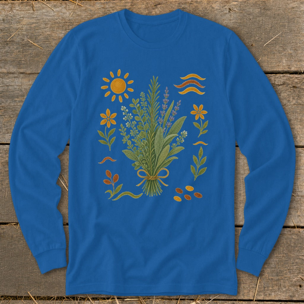 Blue long-sleeve shirt with a central bouquet of herbs and surrounding floral and sun illustrations.