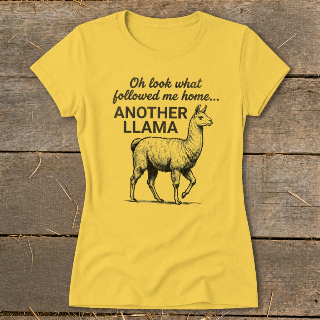 Yellow t-shirt with a drawing of a llama and text "Oh look what followed me home... ANOTHER LLAMA".