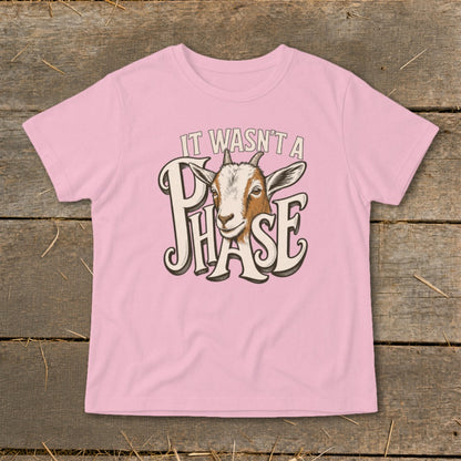 Pink t-shirt with a goat illustration and text "It Wasn't a Phase".