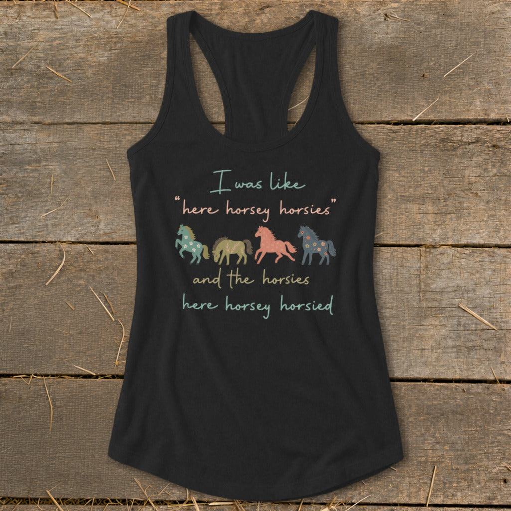 Black tank top with text and four colorful horses.