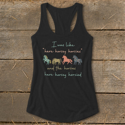 Black tank top with text and four colorful horses.