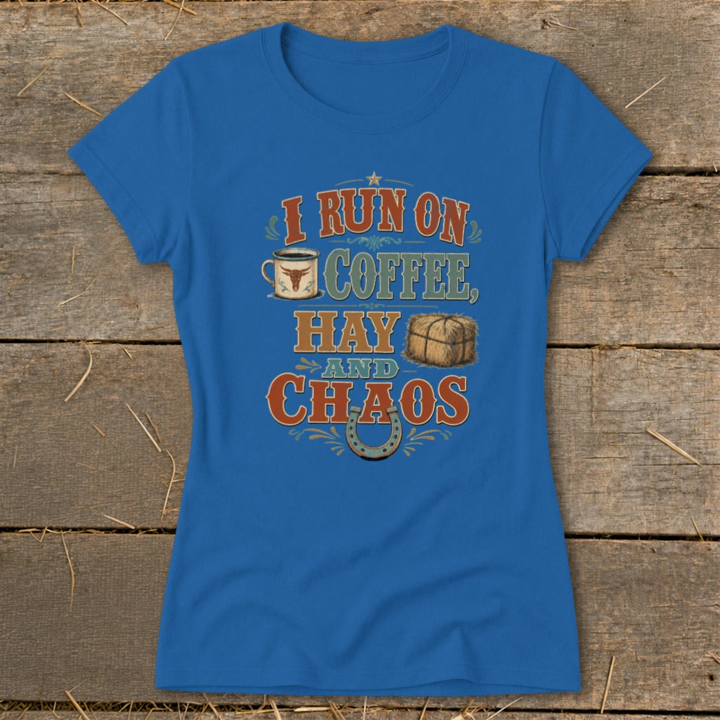 Blue t-shirt with text "I run on coffee, hay and chaos" and graphics.