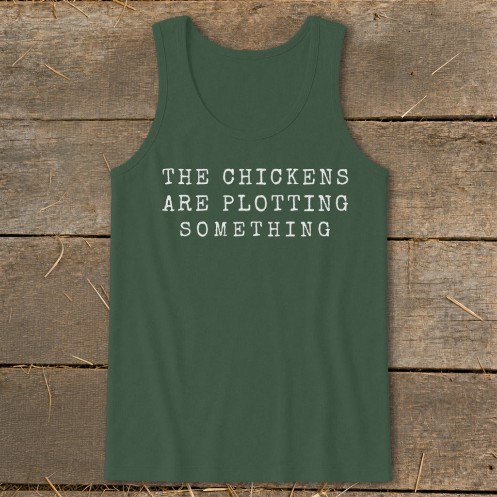 Dark green tank top with white text "THE CHICKENS ARE PLOTTING SOMETHING".