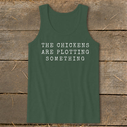 Dark green tank top with white text "THE CHICKENS ARE PLOTTING SOMETHING".