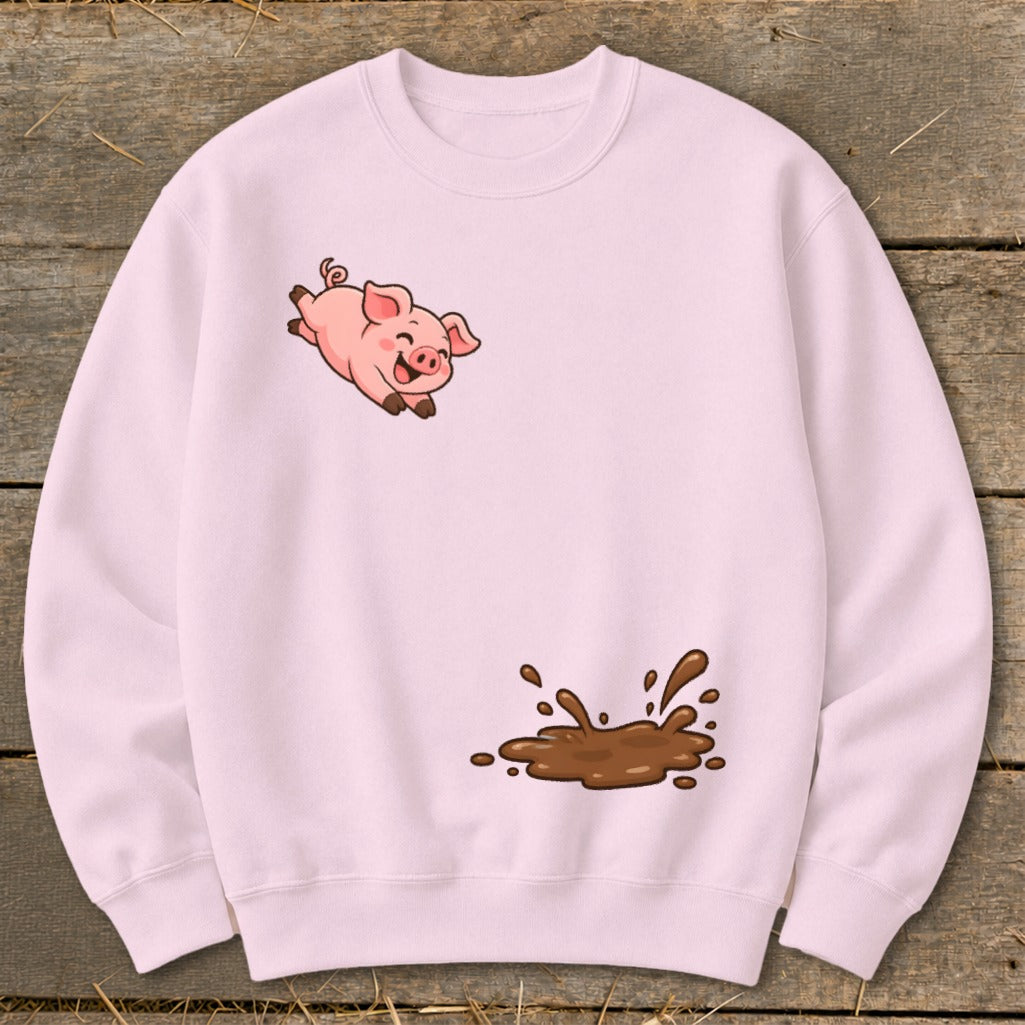 Light pink sweatshirt with a cartoon pig jumping over a mud splash graphic.