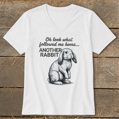 White v-neck t-shirt with rabbit illustration and text "Oh look what followed me home... ANOTHER RABBIT".