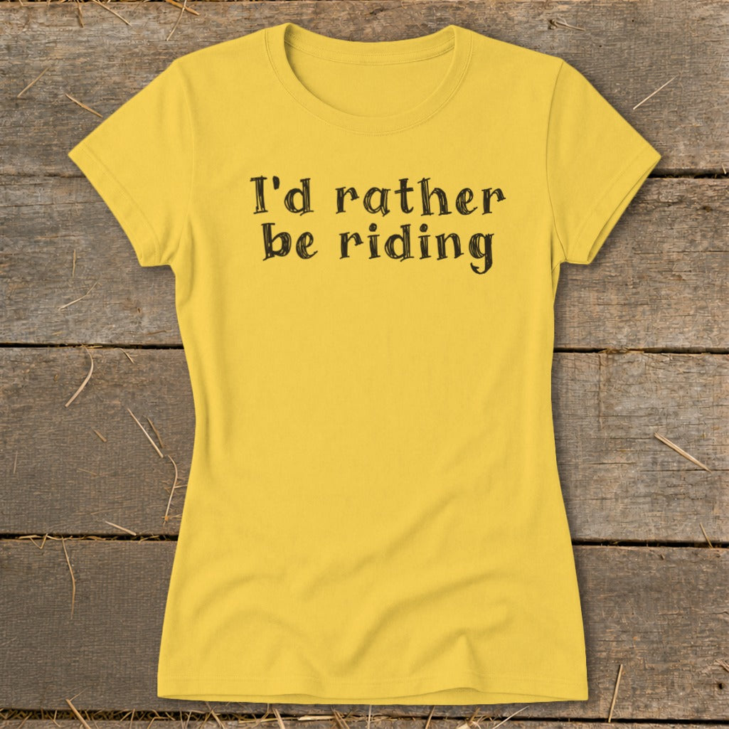 Yellow t-shirt with "I'd rather be riding" text in black font.