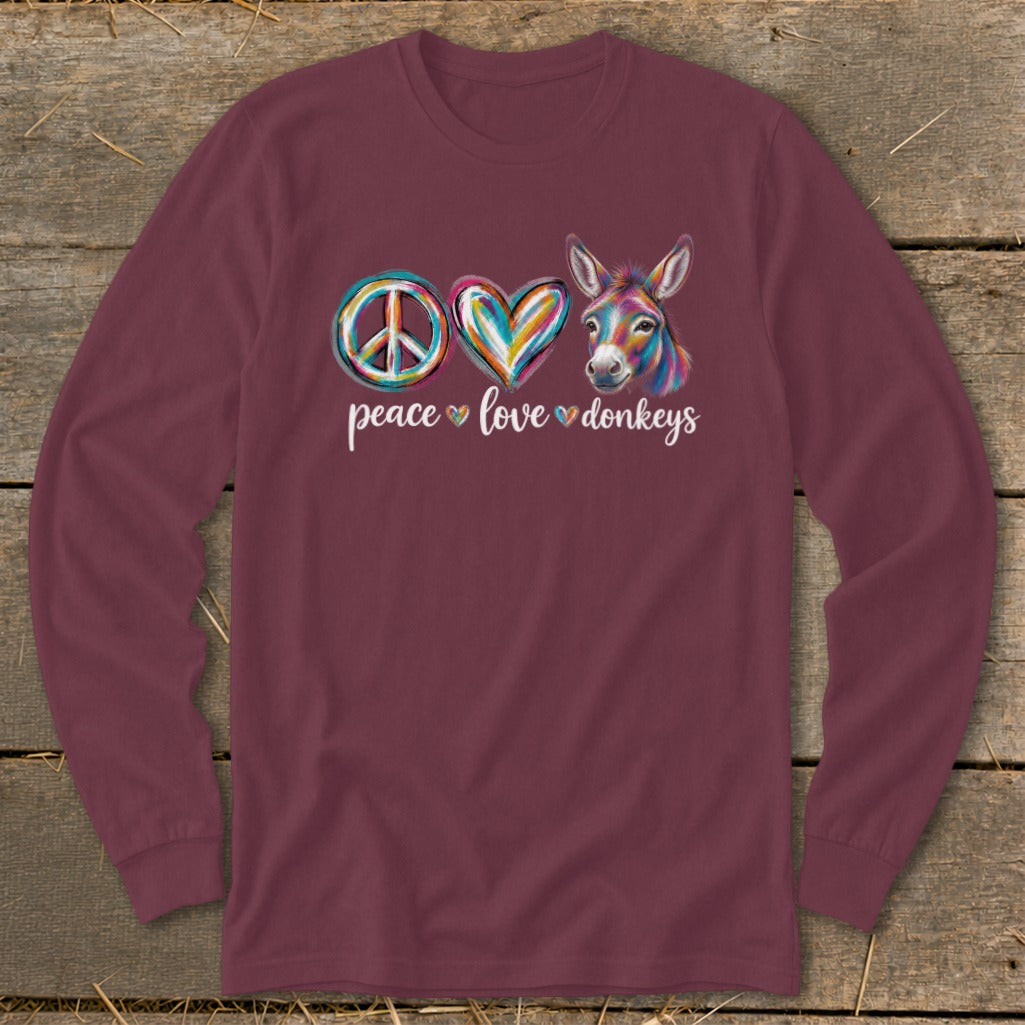 Maroon long sleeve shirt with peace, love, and donkey graphic.