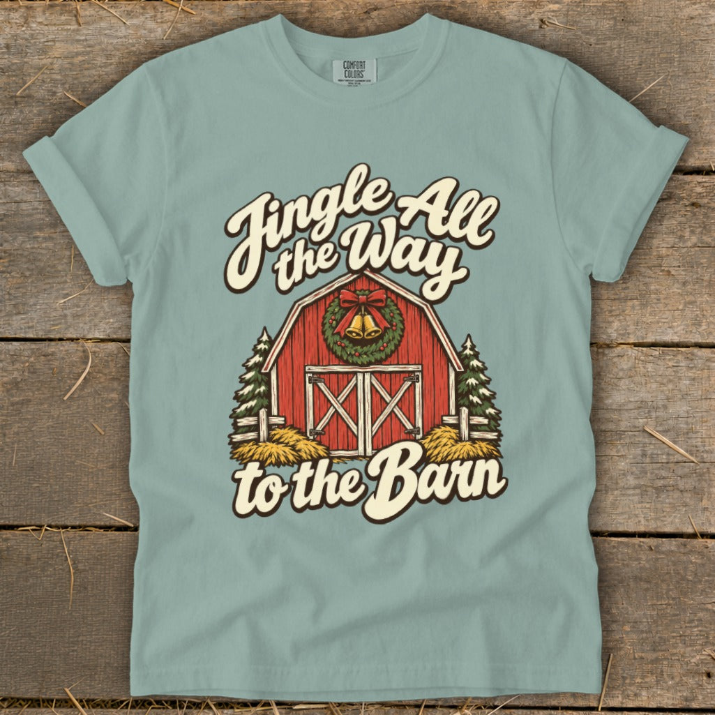 T-shirt graphic of a barn with text "Jingle All the Way to the Barn."