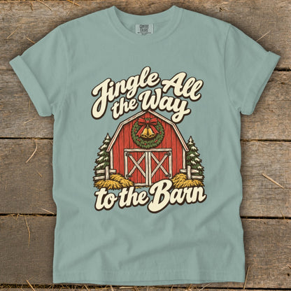 T-shirt graphic of a barn with text "Jingle All the Way to the Barn."