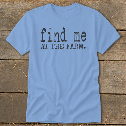 Light blue t-shirt with black text "find me AT THE FARM.".