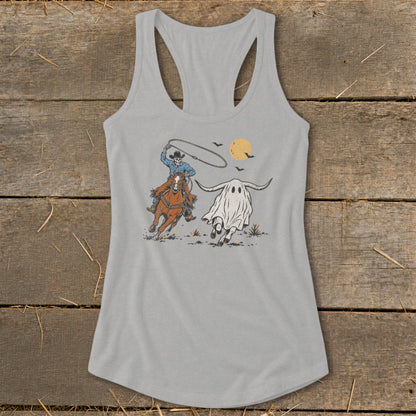 Skeleton cowboy on horse lassoing a ghost longhorn under a full moon.
