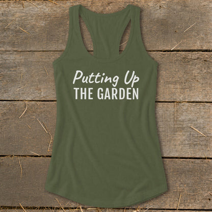 Olive green tank top with white text reading "Putting Up THE GARDEN".