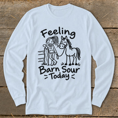 White long sleeve shirt with cartoon girl, horse, fence, and "Feeling Barn Sour Today" text.