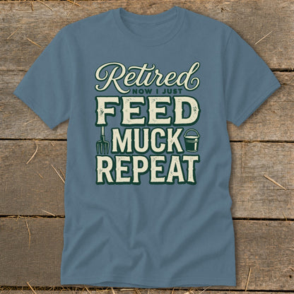 Blue t-shirt with "Retired, Now I Just Feed, Muck, Repeat" text and farm graphics.