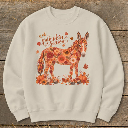 Cream sweatshirt with a donkey adorned with autumn flowers and "Pumpkin Season" text.